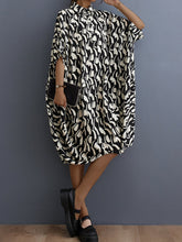 Vestido midi con solapa suelta y estampado floral retro literario
